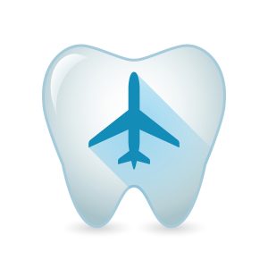 Illustration of an isolated tooth icon with a plane